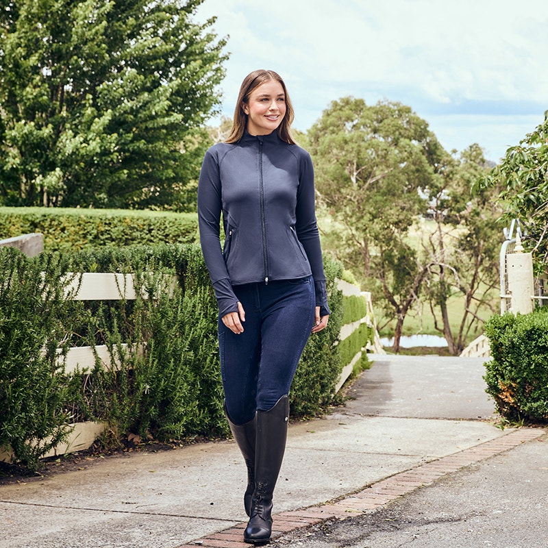 woman stood outside wearing new dublin horse riding apparel